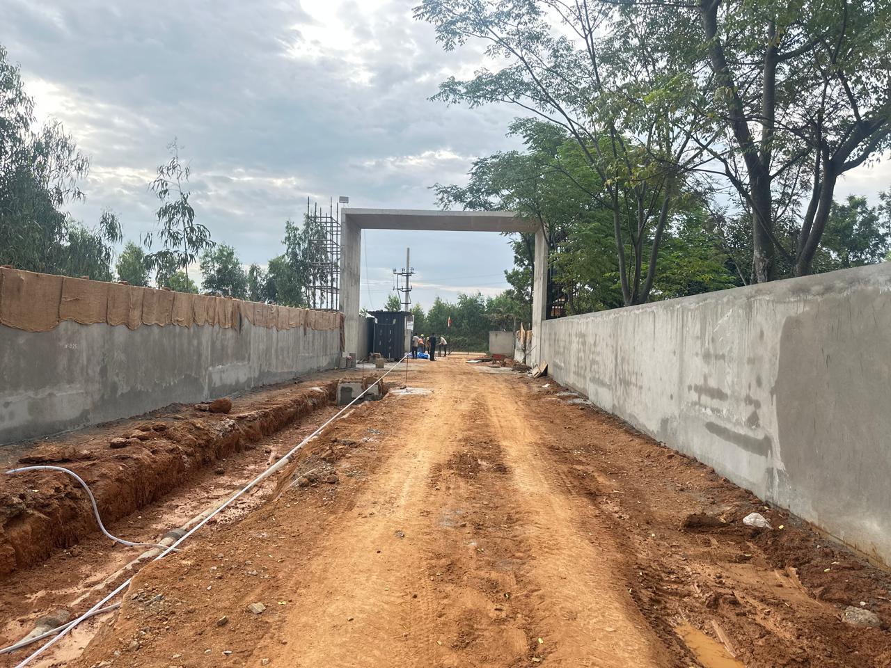 Compound wall at entrance plastering work completed