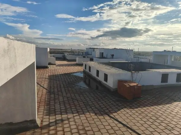 Above terrace activities Waterproofing completed Clay tile floor work in progress Terrace painting work in progress