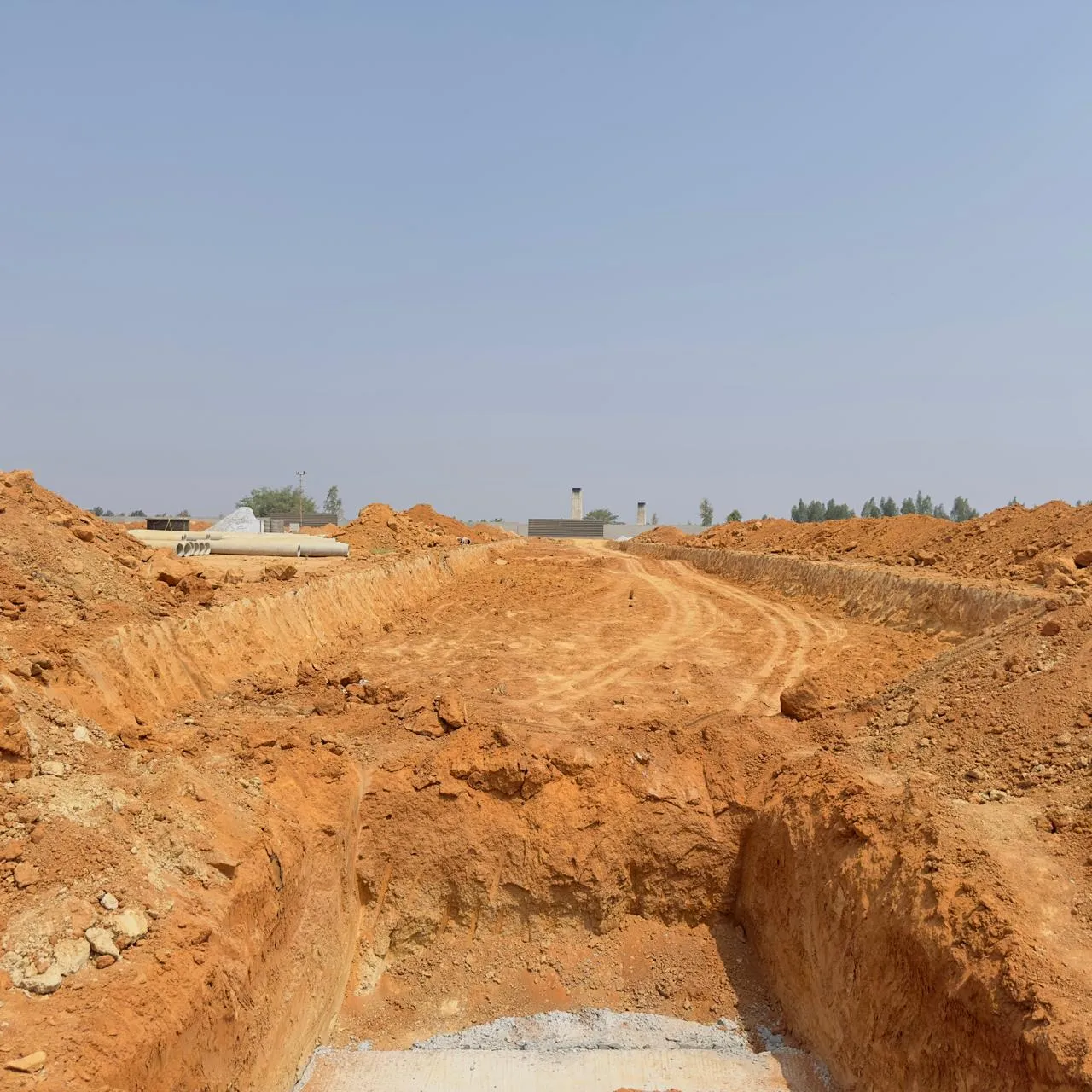 Road formation and excavation for sewage works in progress.