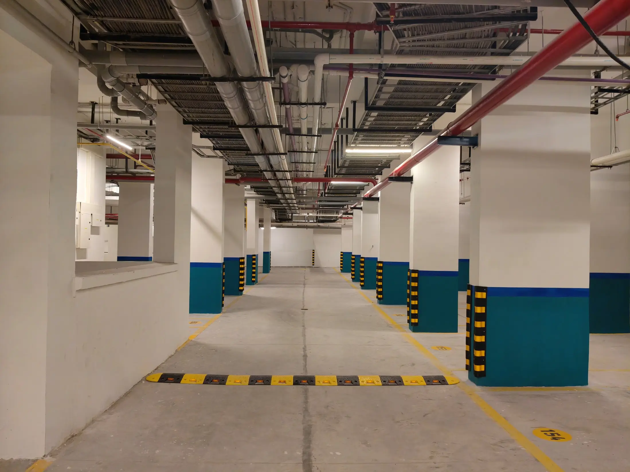 Basement Car parking marking, painting column guard fixing completed