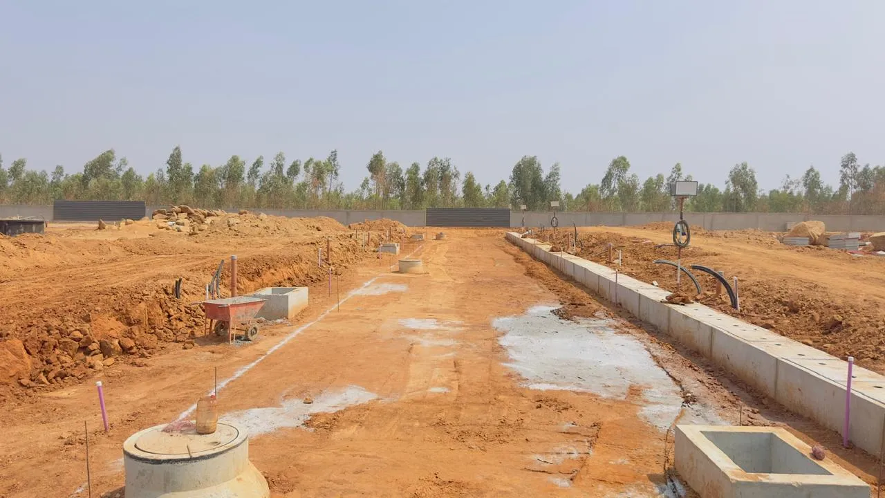 Storm water drain installation works completed, and soil backfilling works in progress.