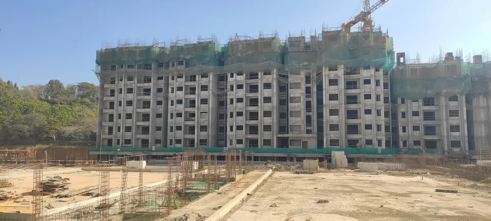 Tower B - 7th floor slab completed. Reinforcement & shuttering work in progress for part of 8th floor slab