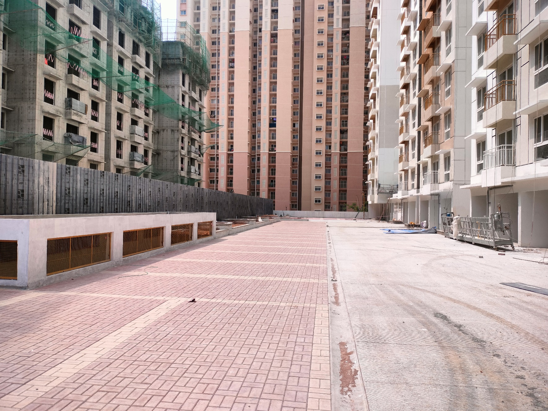 East face( between E and D tower) driveway and car parking work is completed