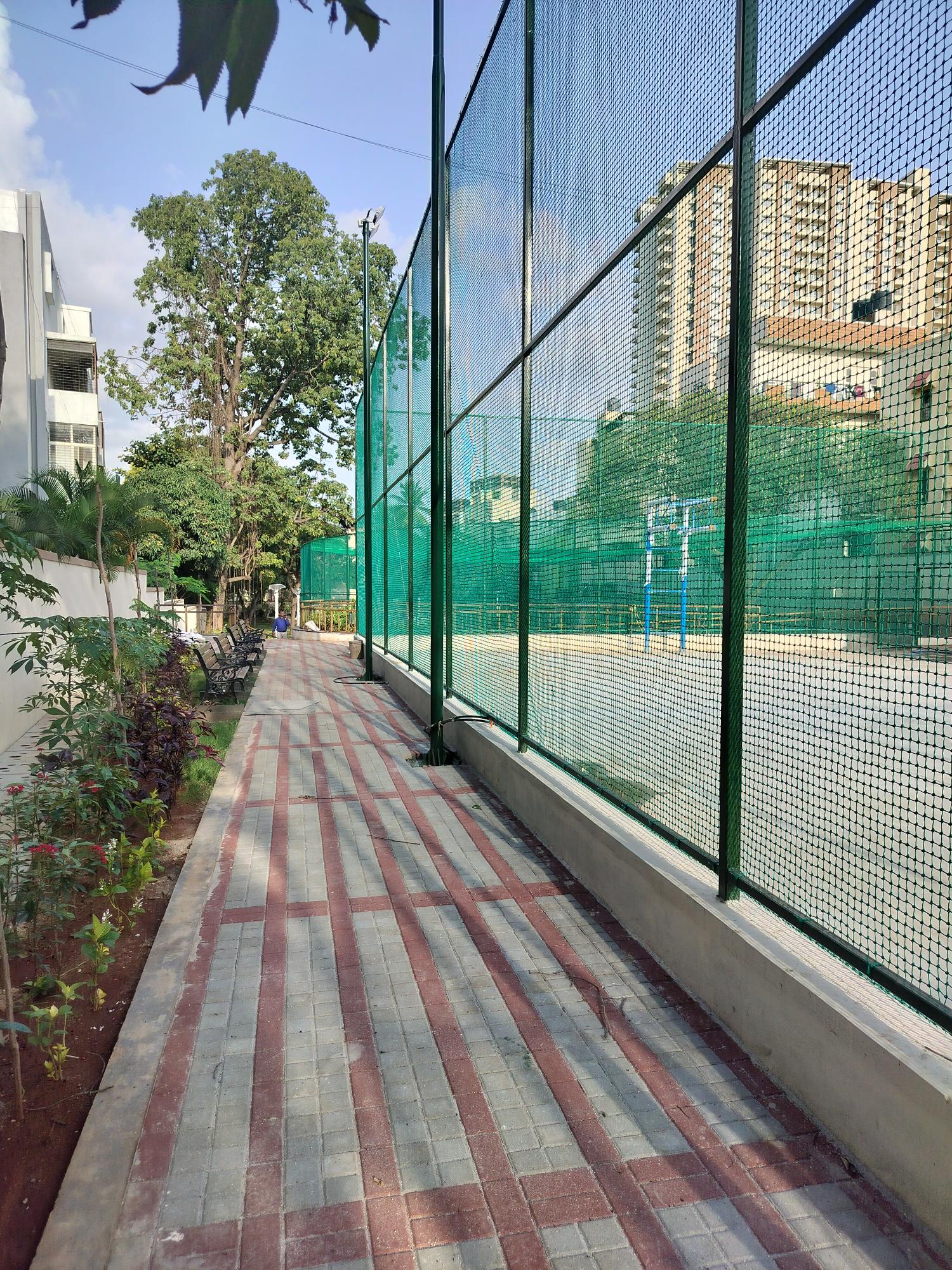 Basketball &futsal court area hardscape & softscape works completed. Sports court flooring works are in progress
