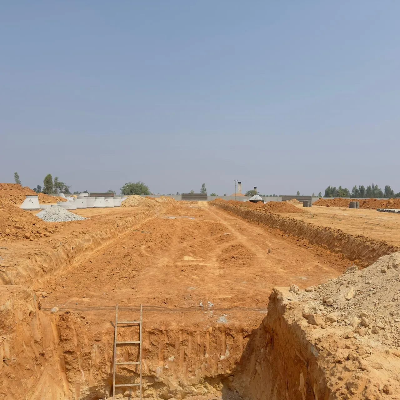 Road formation and excavation for sewage works in progress.