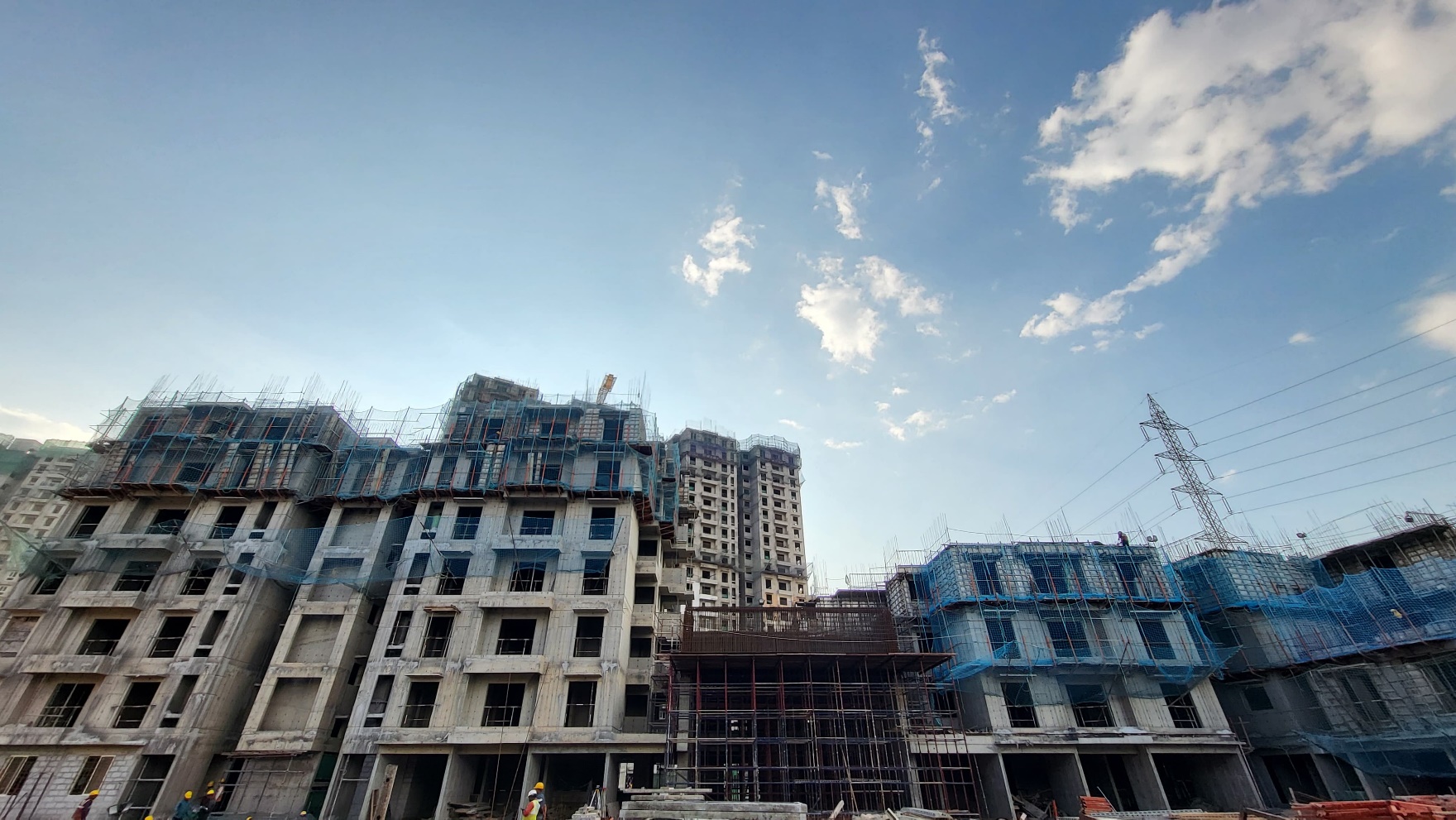 Wing A - Pour 1; 6th-7th Floor Slab Shuttering Work in Progress. Pour 2; 3rd- 4th Floor Reinforcement Work in Progress.