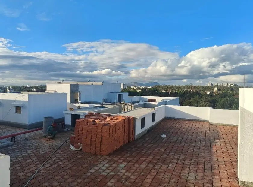 Above terrace activities Waterproofing completed Clay tile floor work in progress Terrace painting work in progress