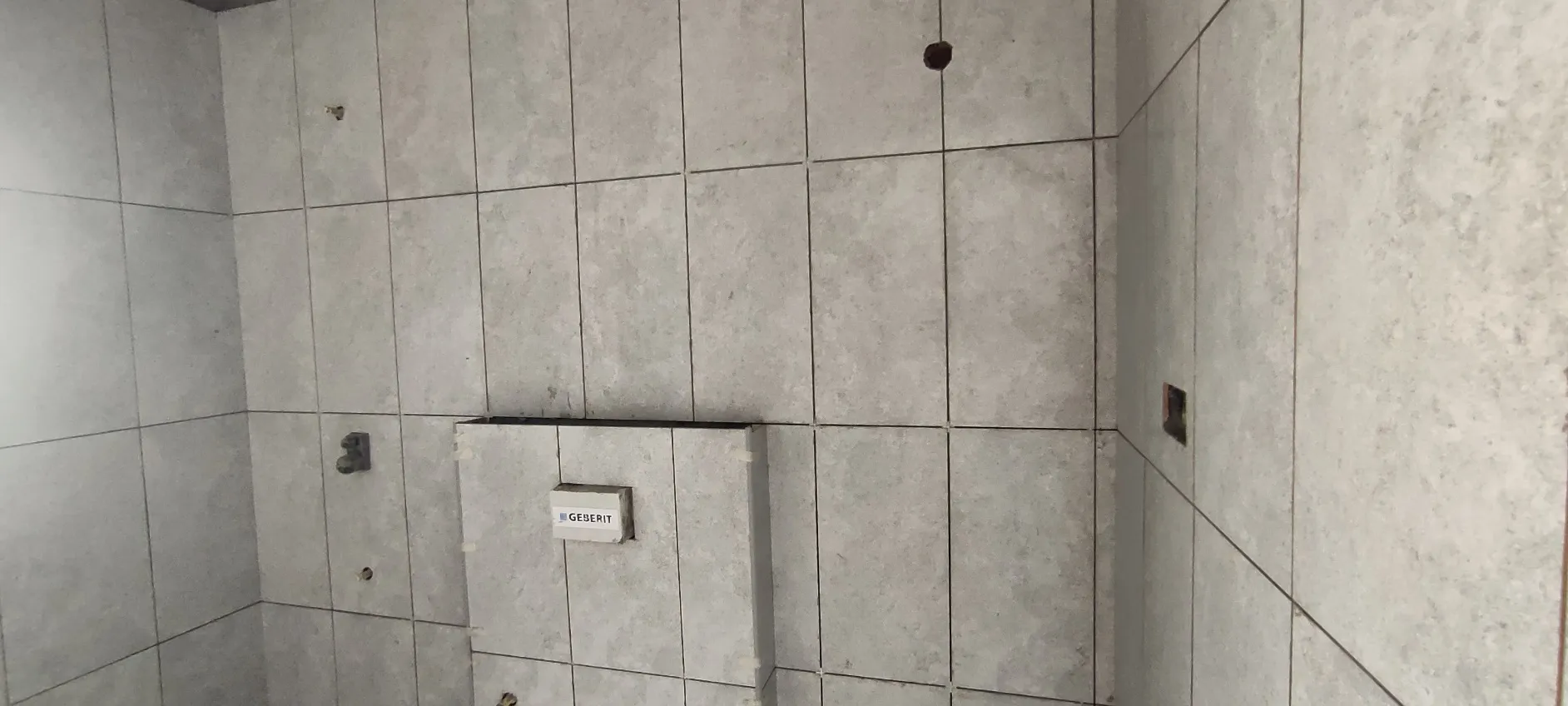 Tower-F Wall Tiling and flooring work in progress.