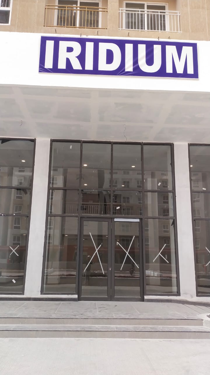 Double height lobby glazing , tiling and false ceiling works