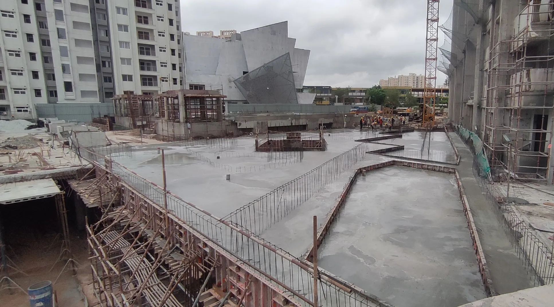 Slab completed between swimming pool & Tower A.