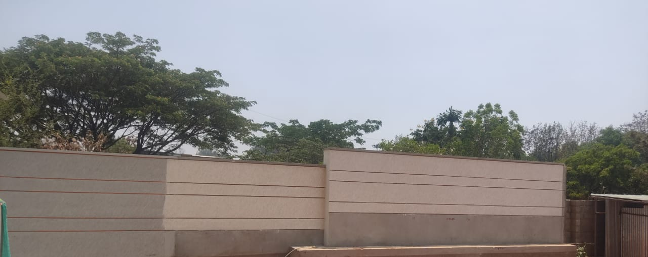 Compound wall finishing in progress
