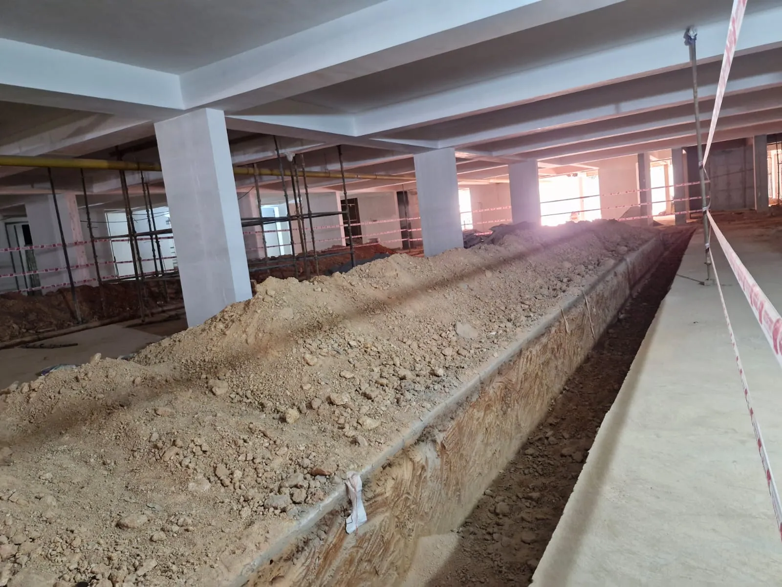 Lower basement pipes laying work in progress