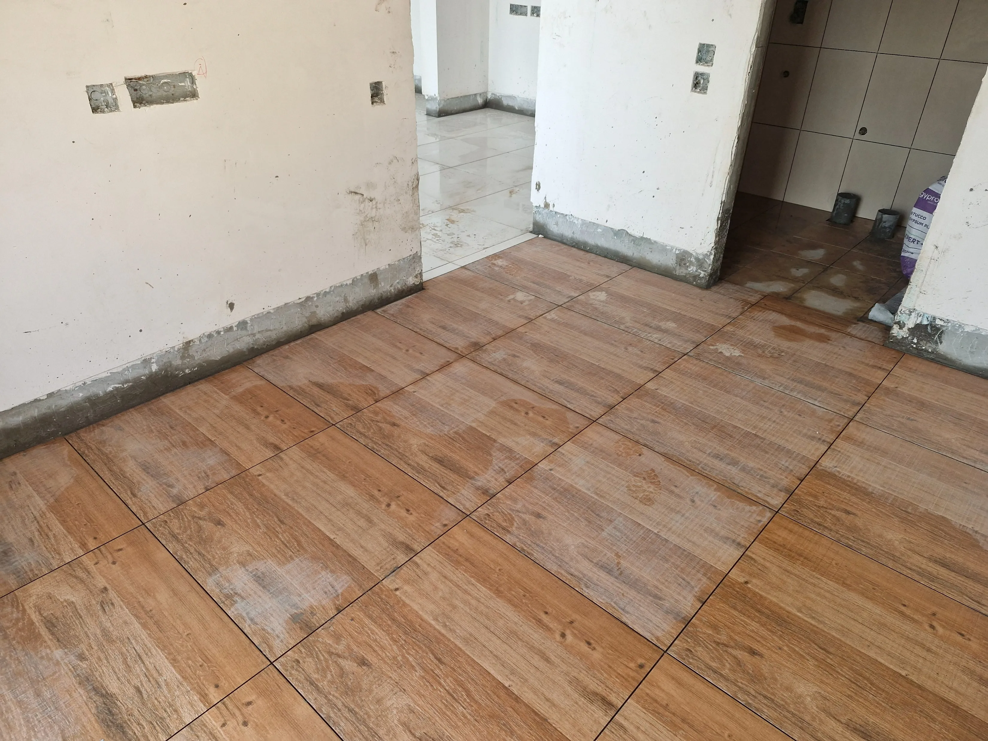 Plastering and  flooring work in progress