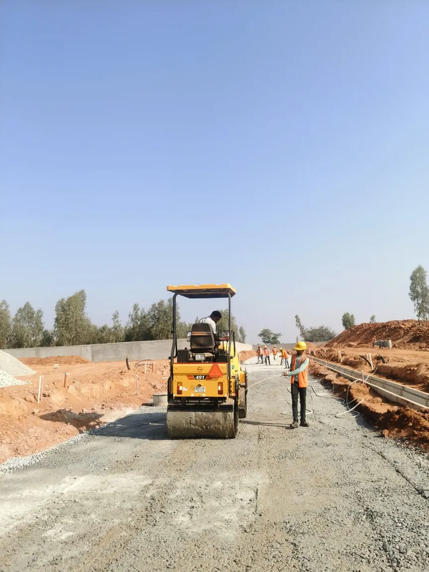 Leveling and compaction work in progress.