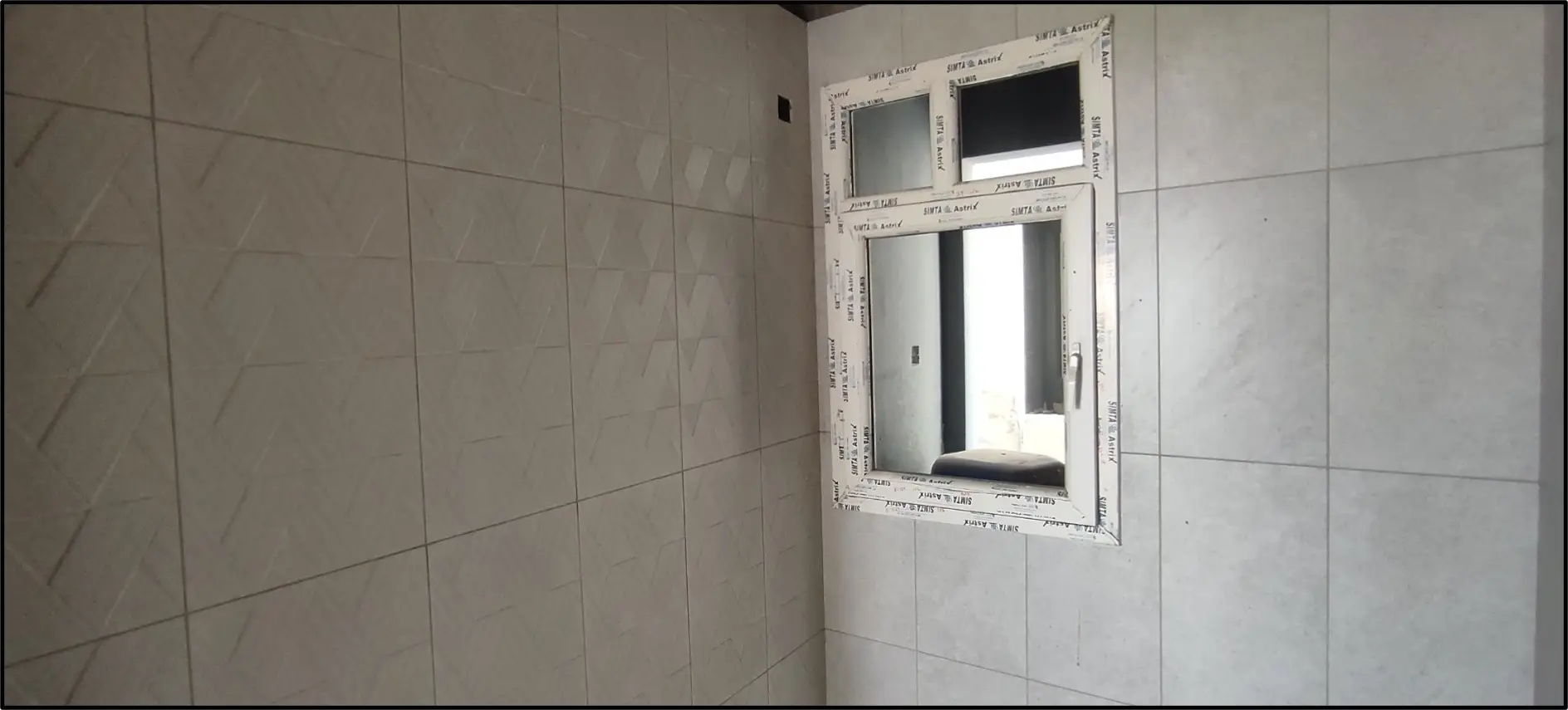 Tower-E Wall Tiling - Flooring and Wall dado in progress.