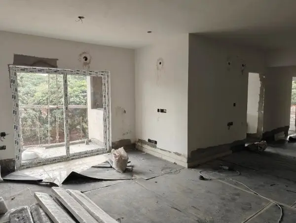 Floor tiling work in progress Plastering work in progress Fixing of Doors and windows is underway Lift installation work in progress