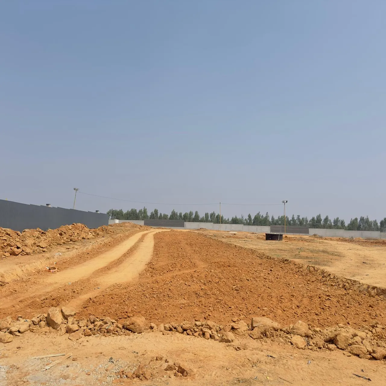 Road formation and excavation for sewage works in progress.