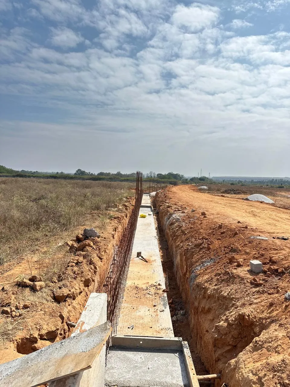 Compound wall work in progress on North side