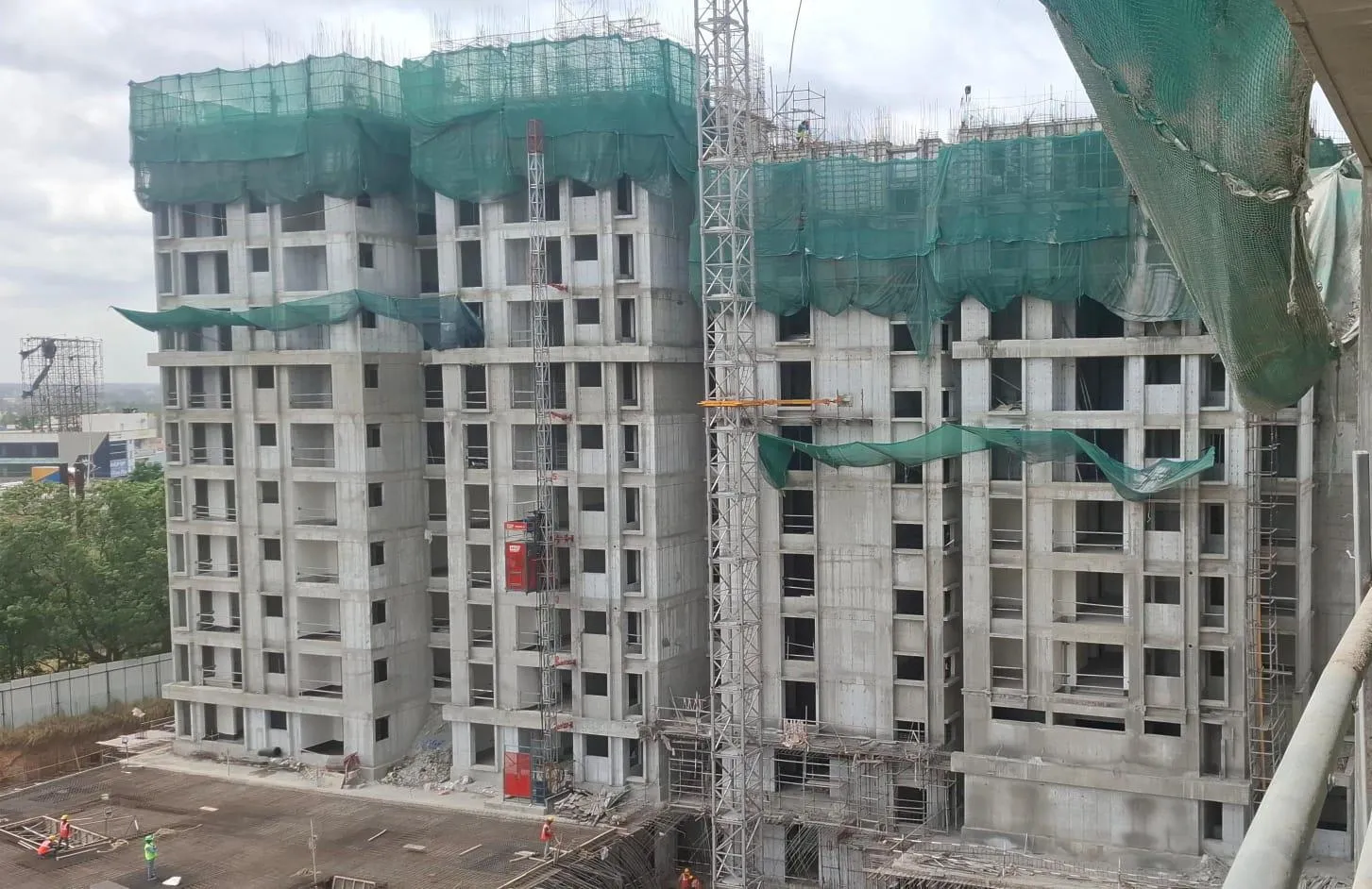 Tower B - Shuttering & Reinforcement work in progress for part of 12th Floor slab Part of 10th Floor slab casted, 10th-11th floor wall reinforcement in progress