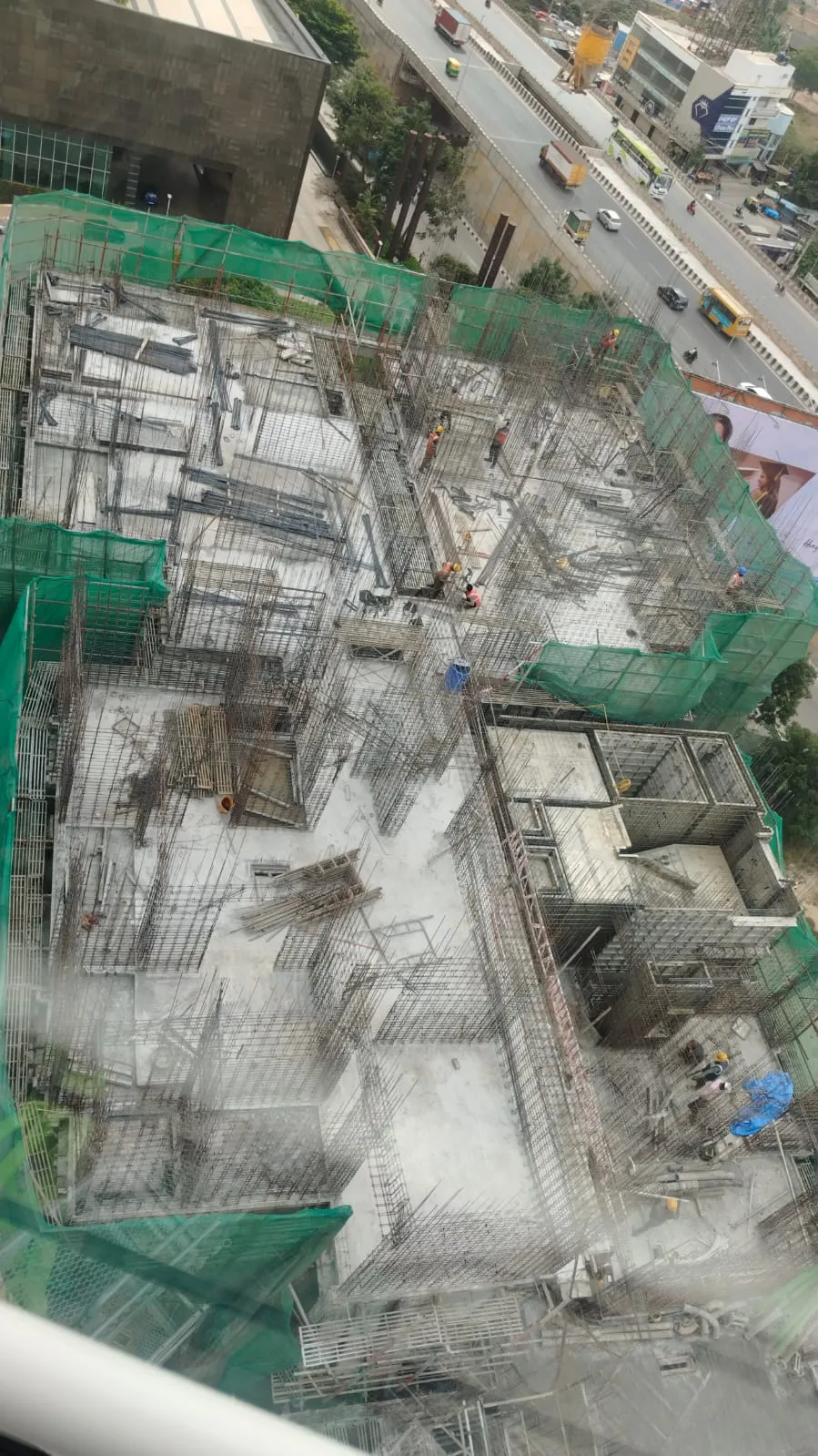 Tower B - Shuttering & Reinforcement work in progress for part of 12th Floor slab Part of 10th Floor slab casted, 10th-11th floor wall reinforcement in progress