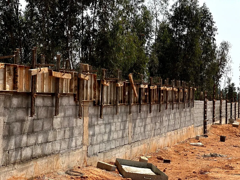 Compound wall work in progress.