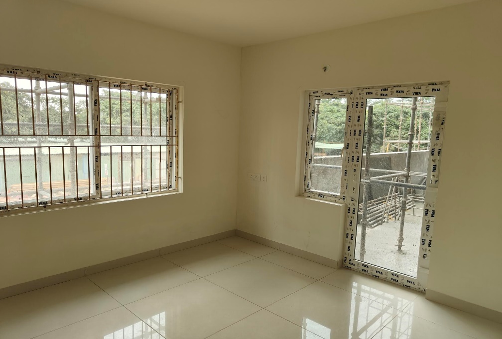 Floor tiling & Fixing of Doors and windows work in progress