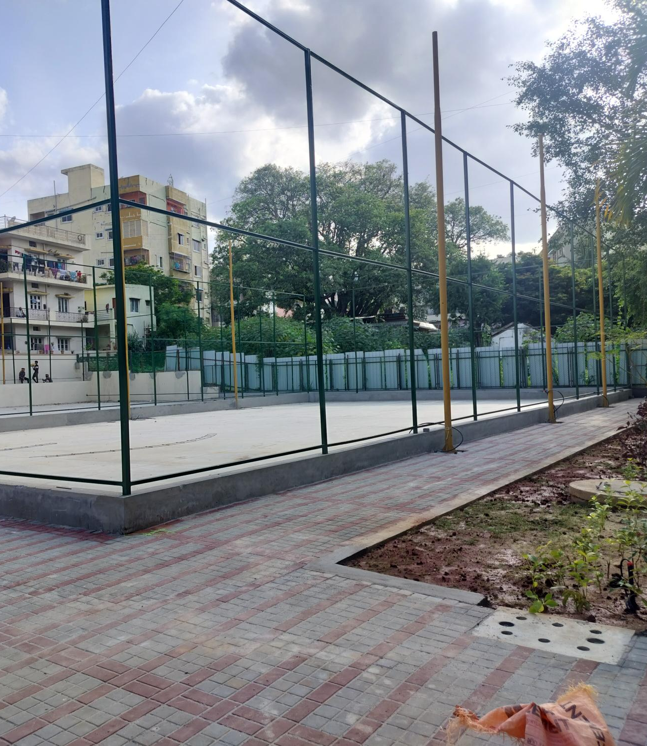 Basketball & futsal court area hardscape works completed. Soft scape works are in progress