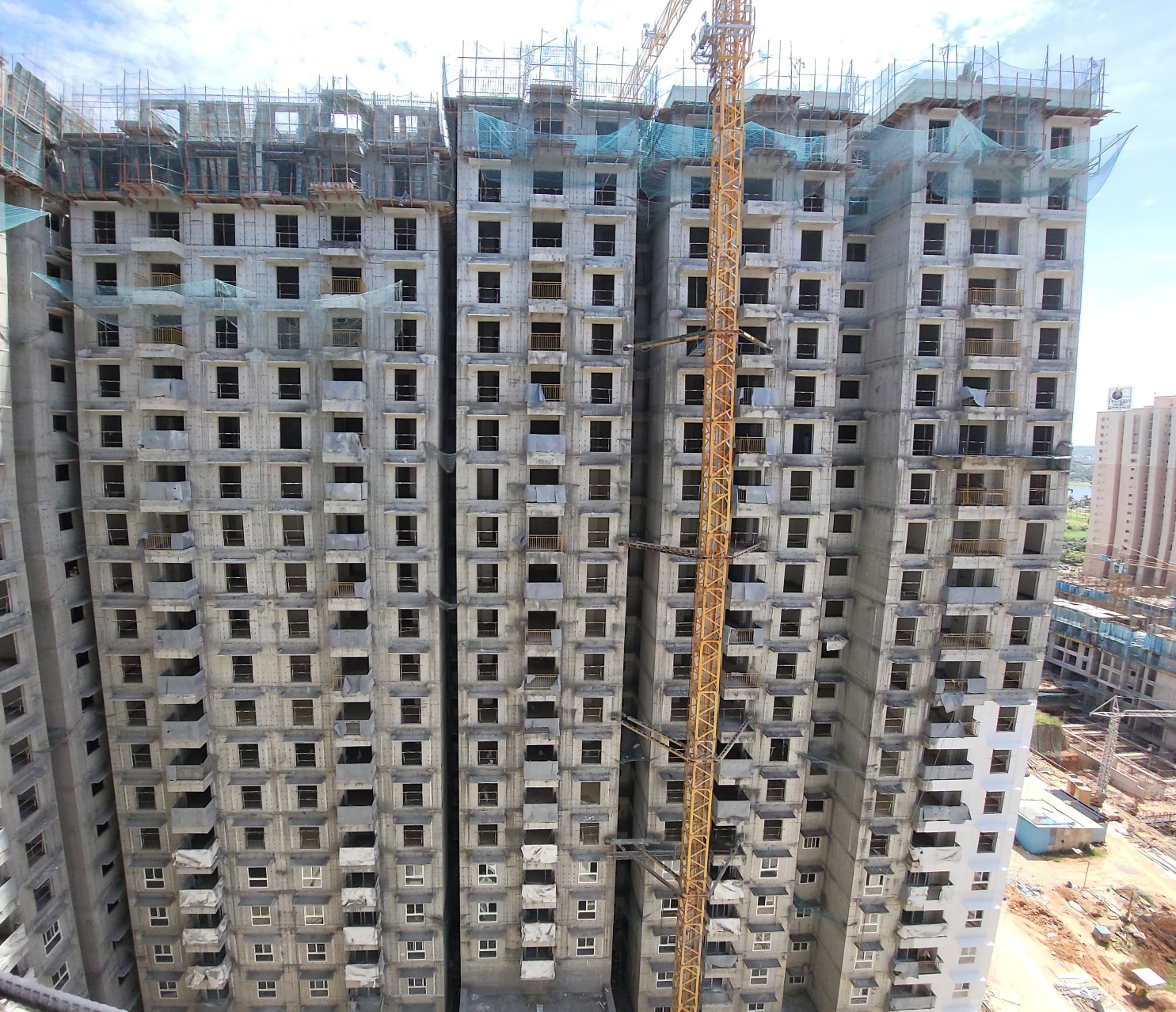 Wing C - Terrace slab completed for part of the slab     Parapet wall work in progress.