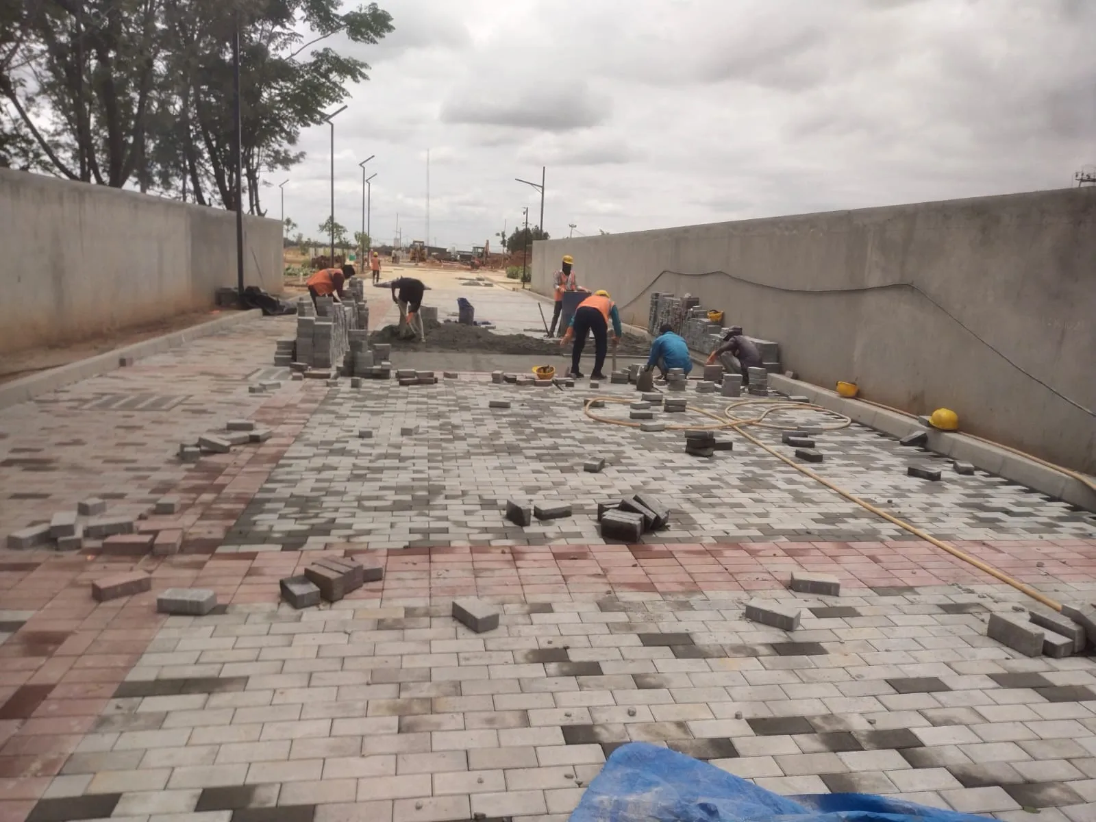 Entrance Main Road Driveway Pavers laying works.