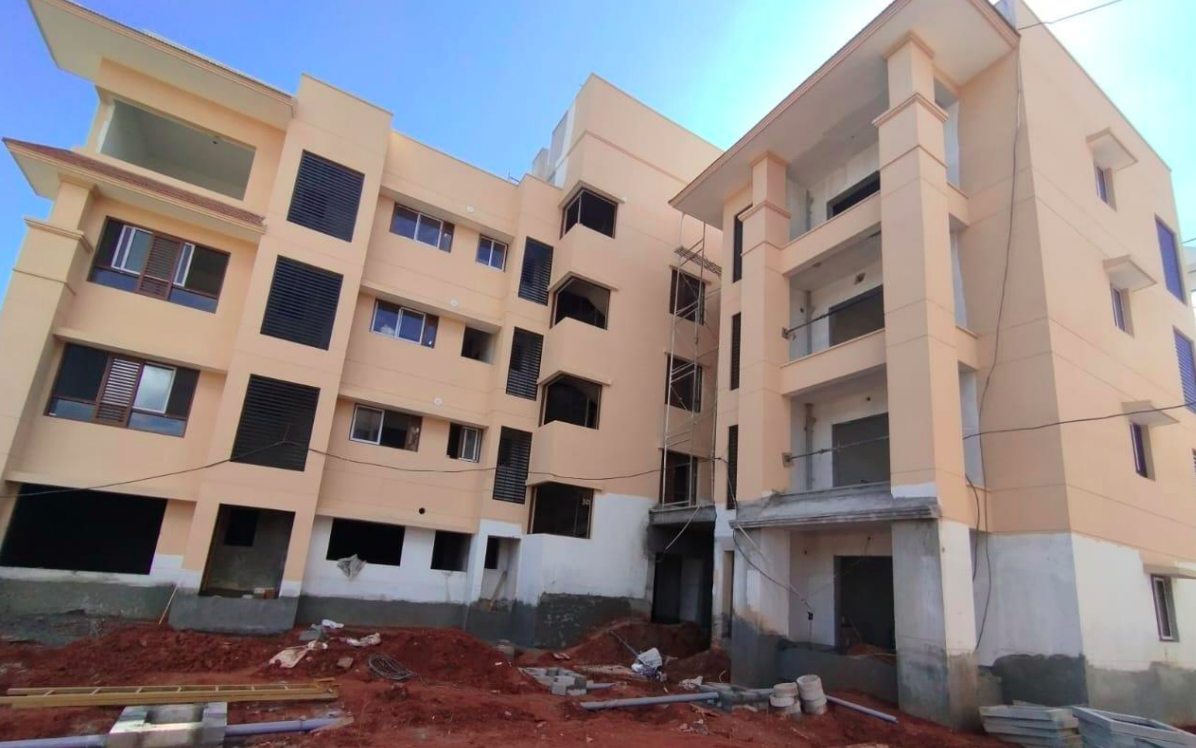 WX – Structure & Masonry work completed plastering and painting and tiling work in Progress.