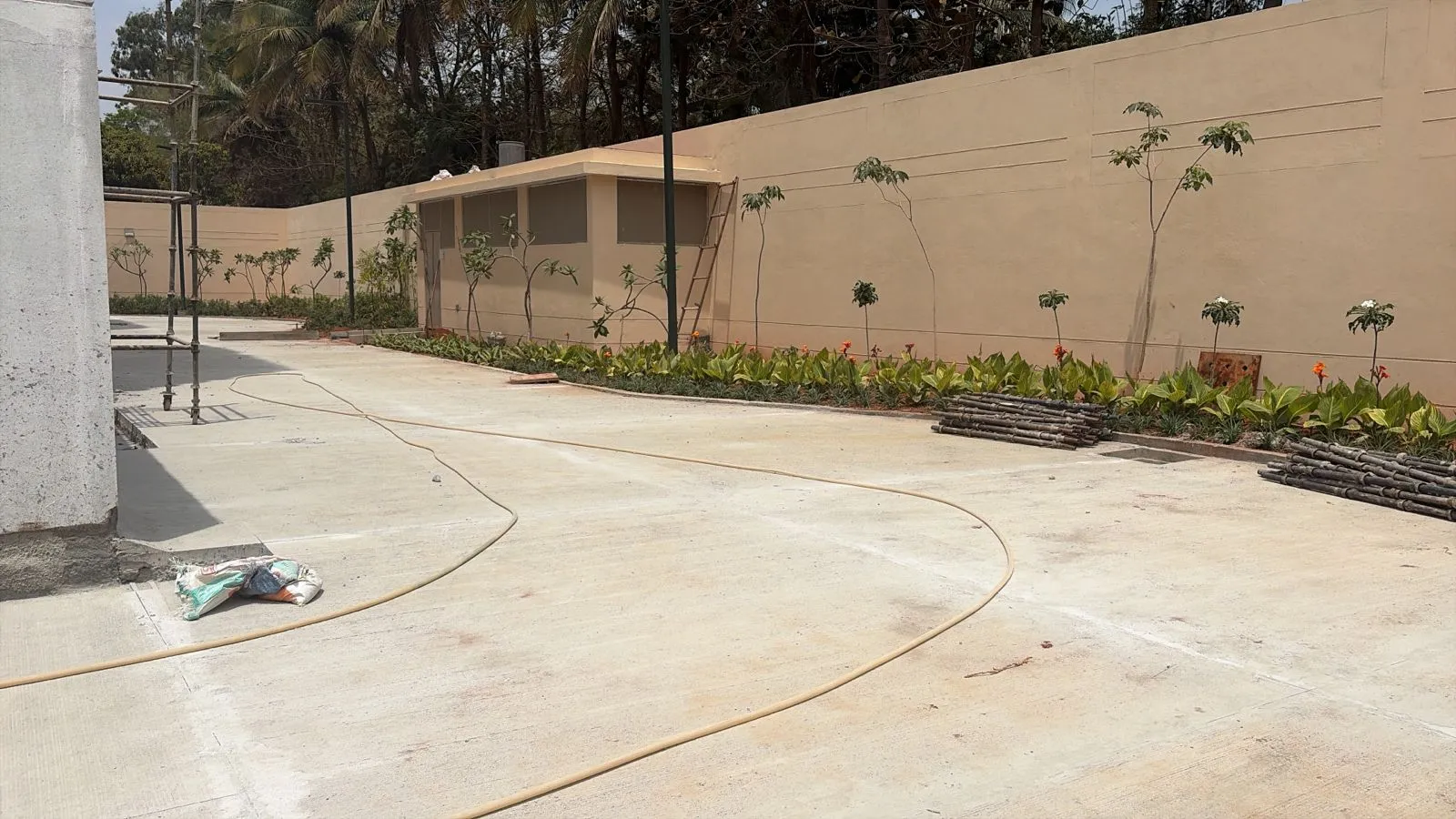 Tower 1 & 2 Tower 1 & 2 DG Yard fencing WIP External development Paver's work completed Compound wall first coat completed