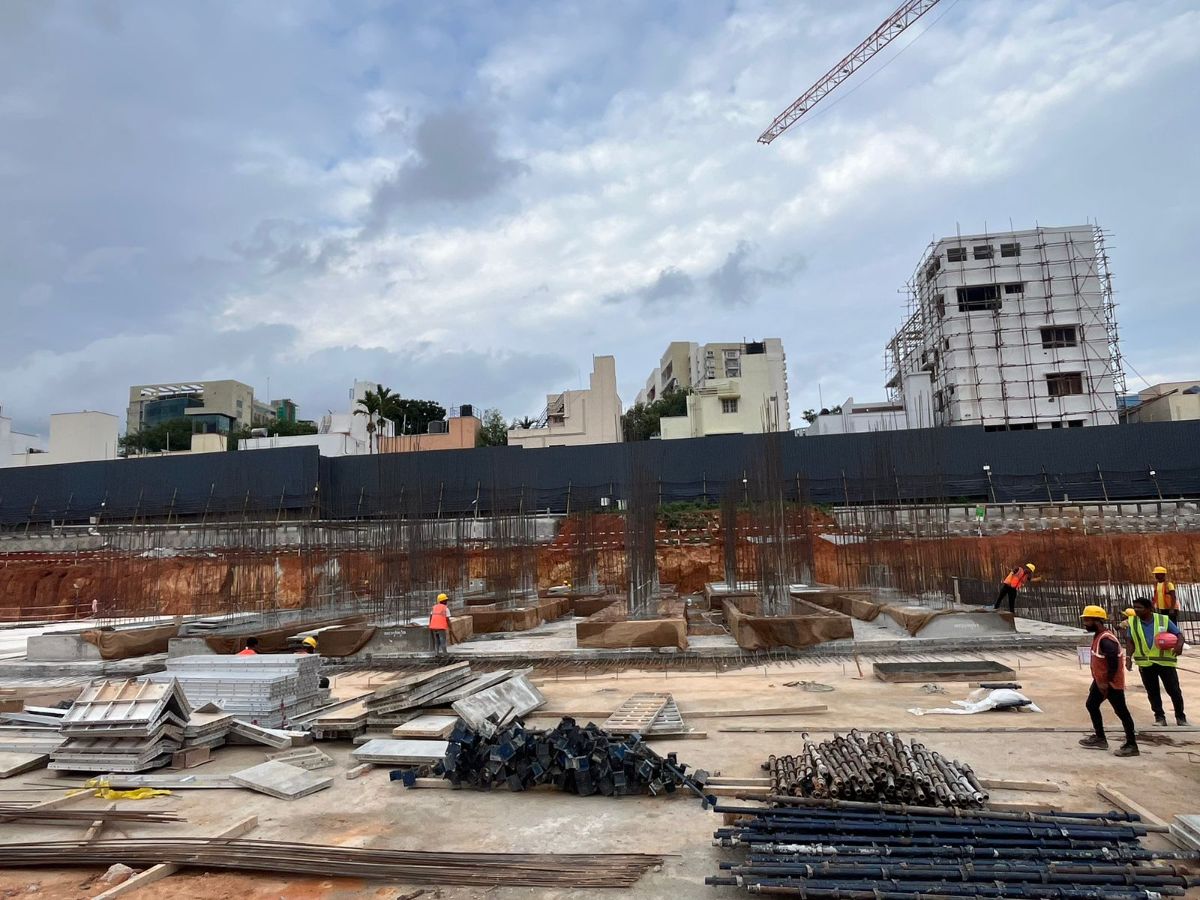 Tower – F: Raft reinforcement and concreting works are in progress.