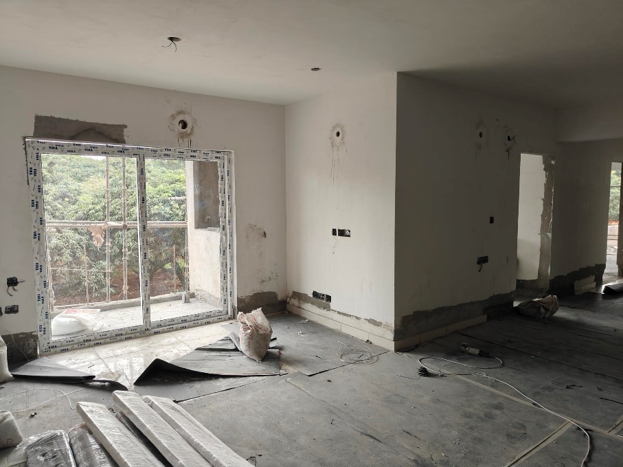 Floor tiling & Fixing of Doors and windows work in progress