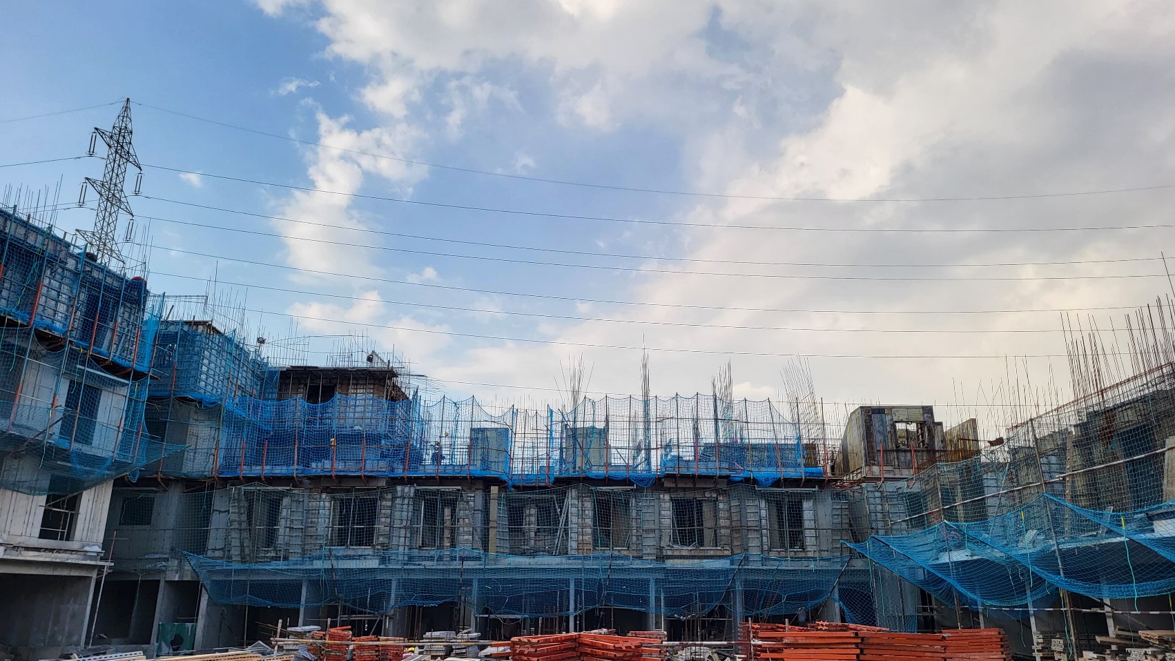 Wing B - Pour 3; 3rd-4th Floor Slab Completed. Pour 4; 2nd-3rd Floor Walls and Beams Reinforcement Work in Progress.