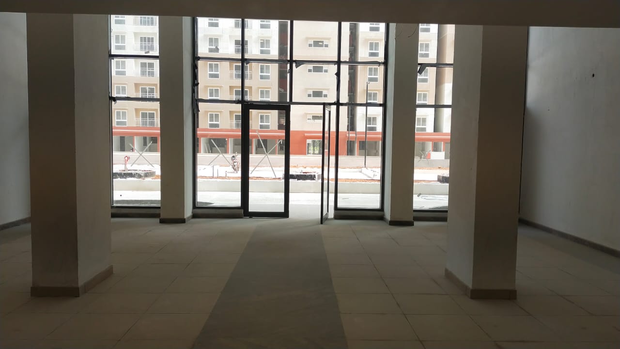 Double height lobby glazing , tiling and false ceiling works