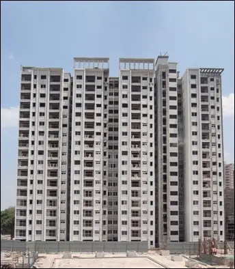 Tower F - External Painting work in Progress. Fixing of windows in Progress