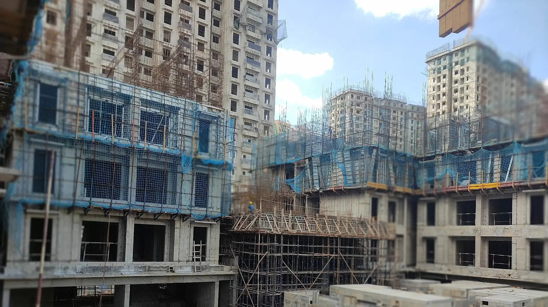 Wing B – 4th floor slab shuttering WIP, Entrance area canopy ready for concrete