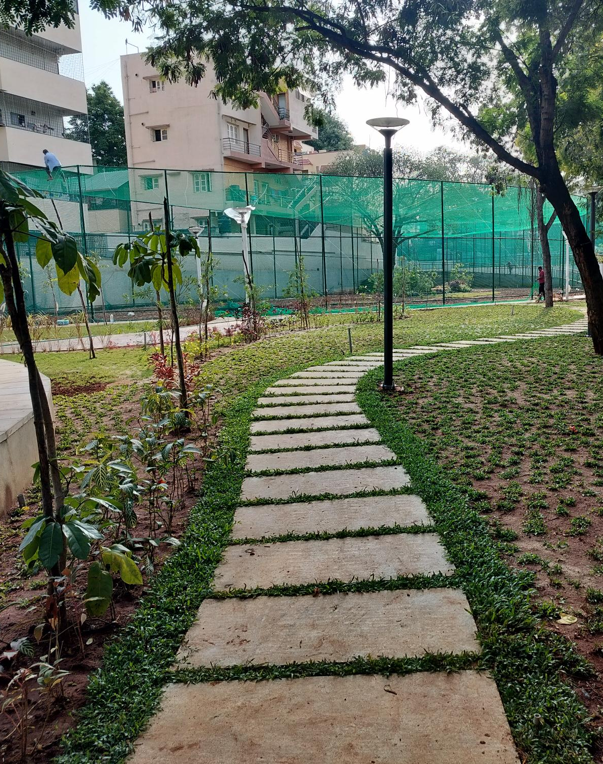 Basketball &futsal court area hardscape & softscape works completed. Sports court flooring works are in progress