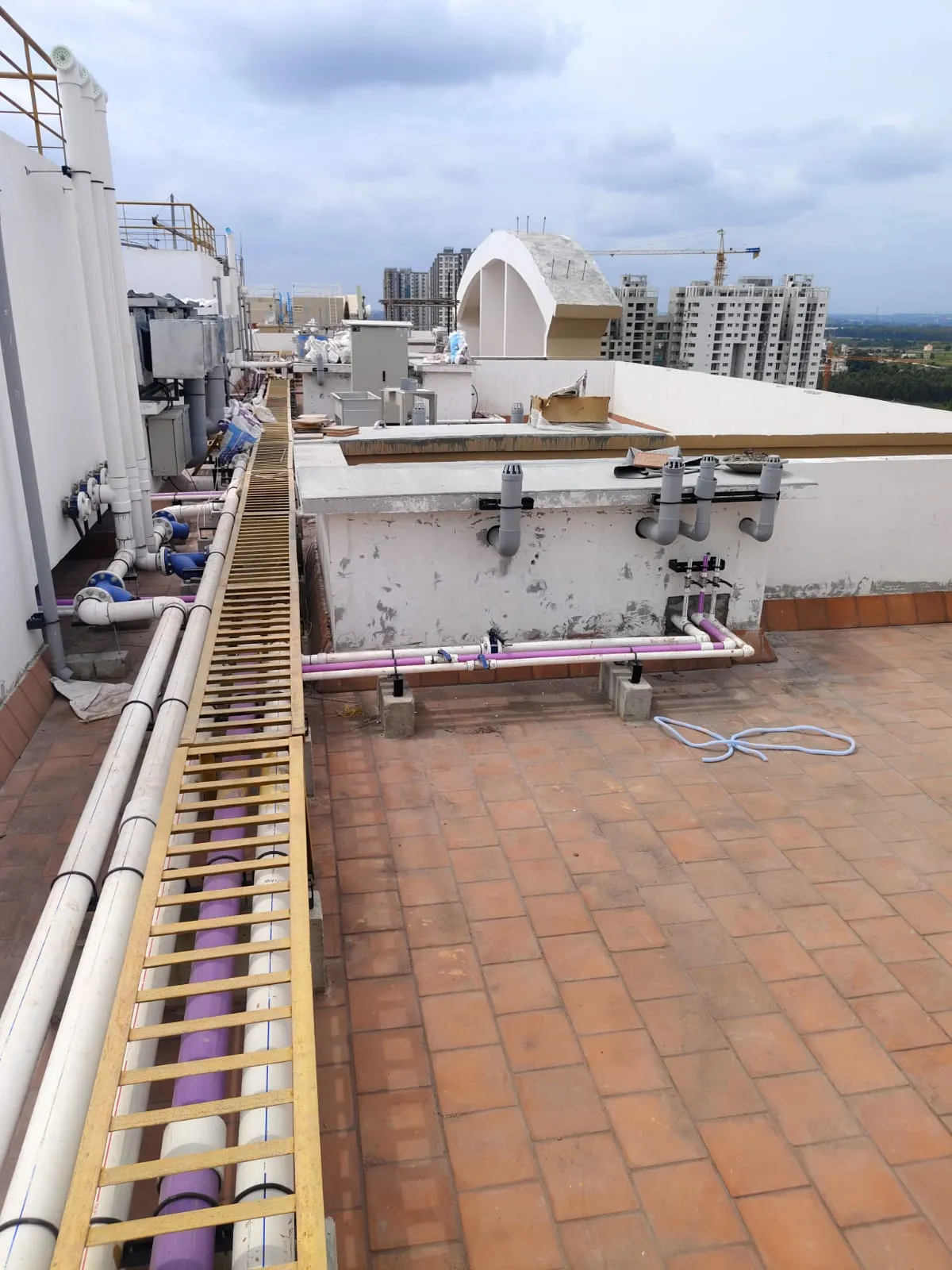 LUMINAIRE – Above terrace painting and services work in progress